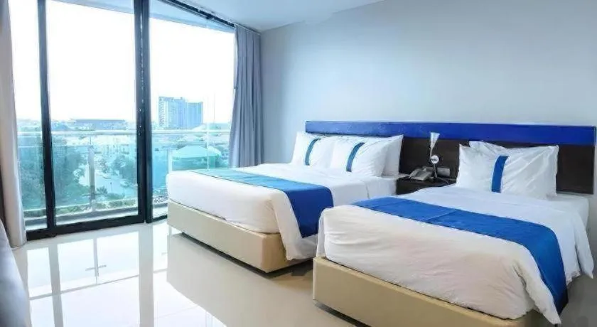 Bed in Ingtara Hotel