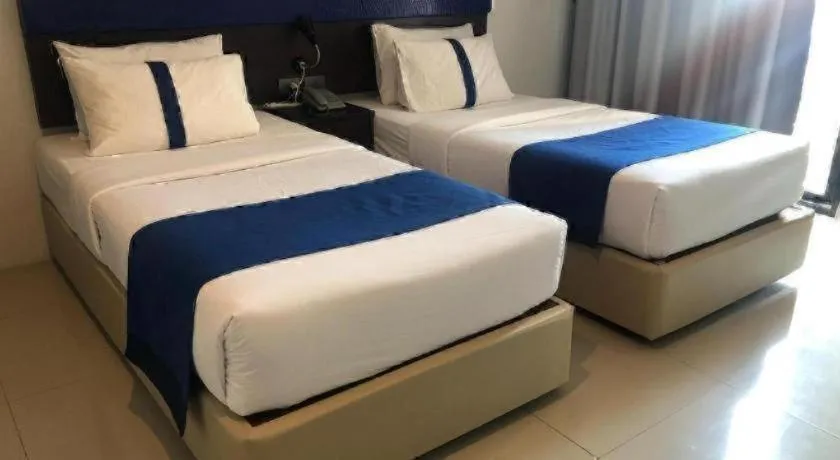 Bed in Ingtara Hotel