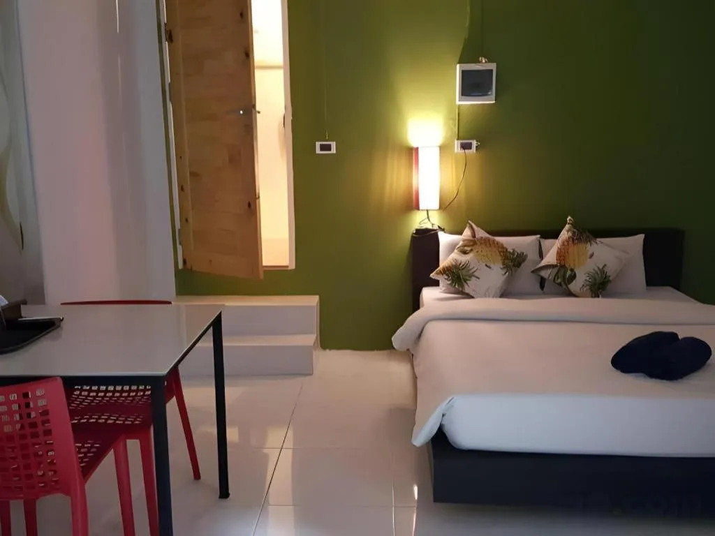 Bed in The Color Express Hotel