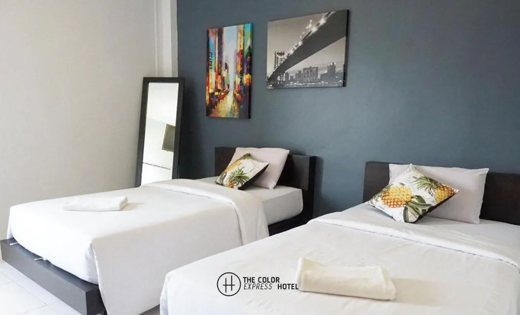 Bed in The Color Express Hotel