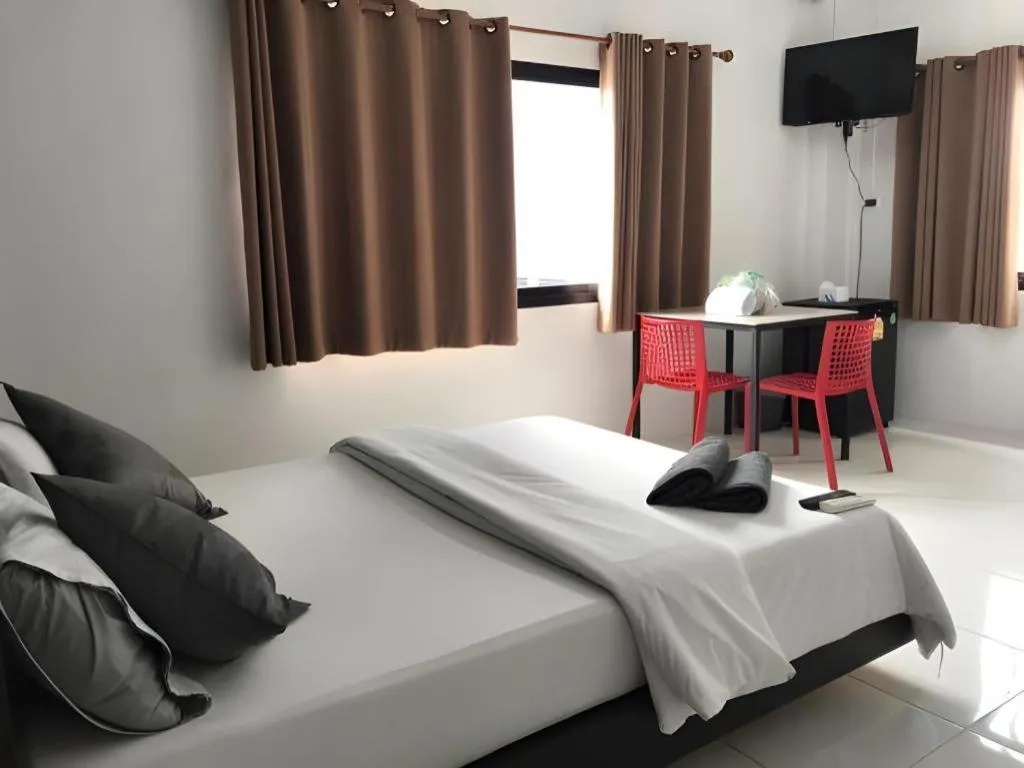 Bed in The Color Express Hotel