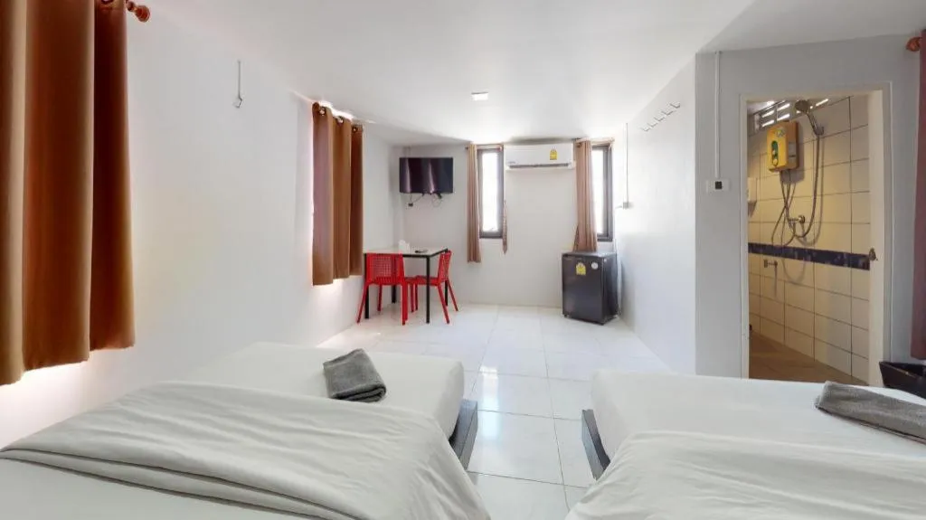 Bed in The Color Express Hotel