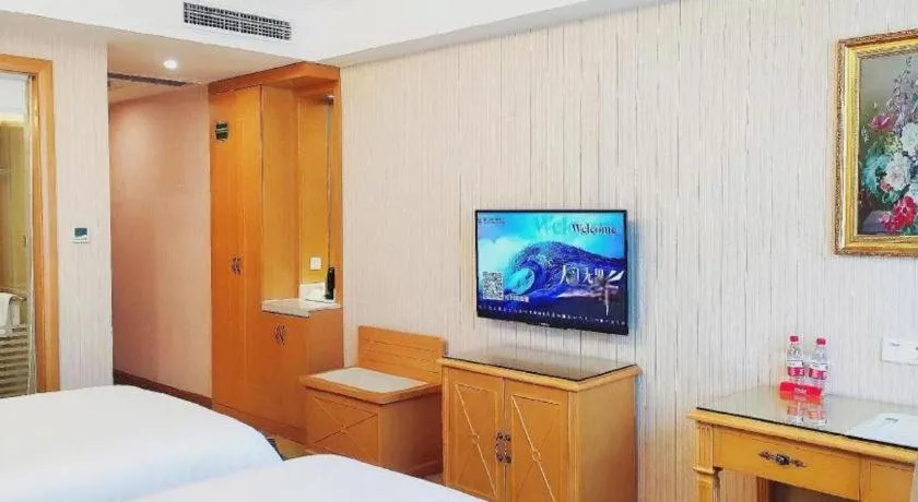 Bed in Vienna Hotel Guangzhou Panyu Shiqiao Center Branch