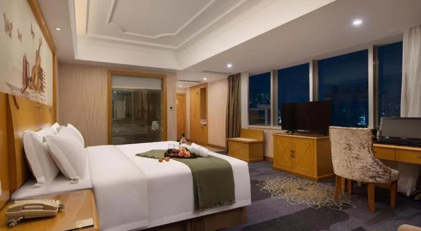 Bed in Vienna Hotel Guangzhou Panyu Shiqiao Center Branch