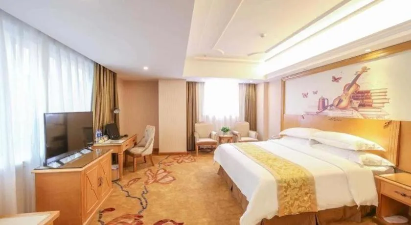Bed in Vienna Hotel Guangzhou Panyu Shiqiao Center Branch