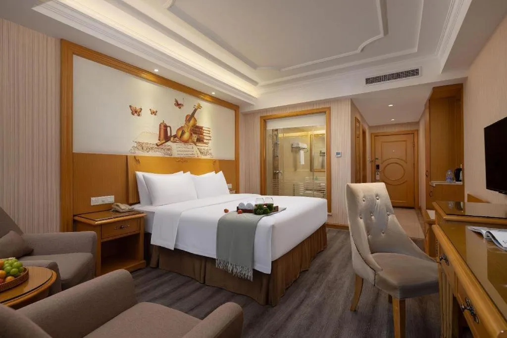 Bed in Vienna Hotel Guangzhou Panyu Shiqiao Center Branch