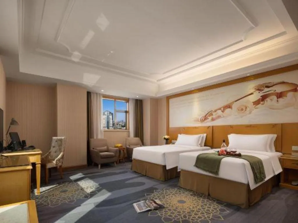 Bed in Vienna Hotel Guangzhou Panyu Shiqiao Center Branch