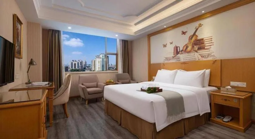 Bed in Vienna Hotel Guangzhou Panyu Shiqiao Center Branch