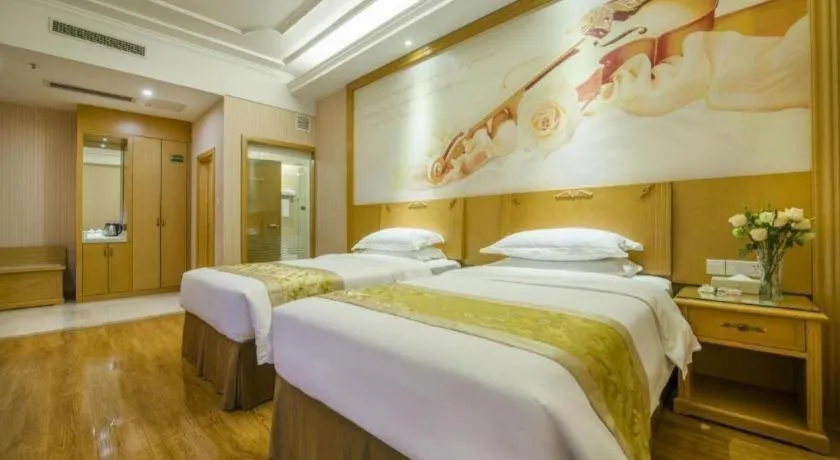 Bed in Vienna Hotel Guangzhou Panyu Shiqiao Center Branch