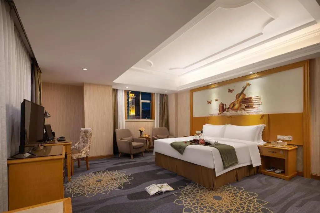 Bed in Vienna Hotel Guangzhou Panyu Shiqiao Center Branch