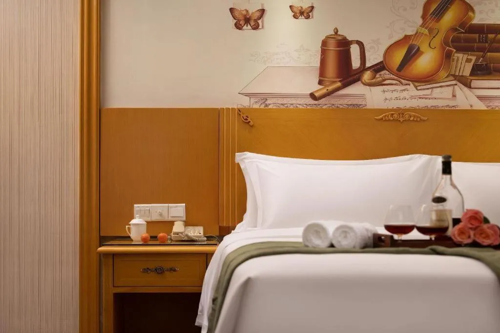 Bed in Vienna Hotel Guangzhou Panyu Shiqiao Center Branch