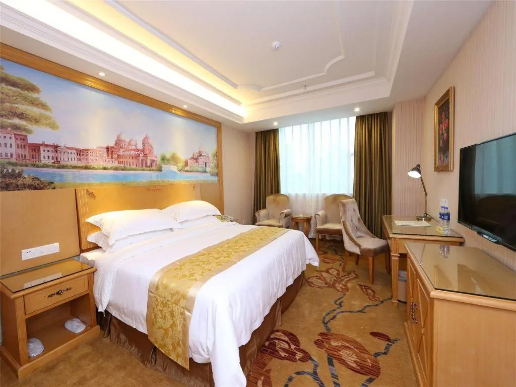 Bed in Vienna Hotel Guangzhou Panyu Shiqiao Center Branch