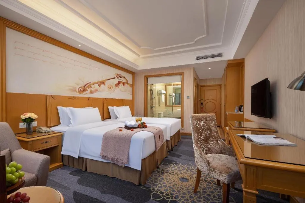 Bed in Vienna Hotel Guangzhou Panyu Shiqiao Center Branch