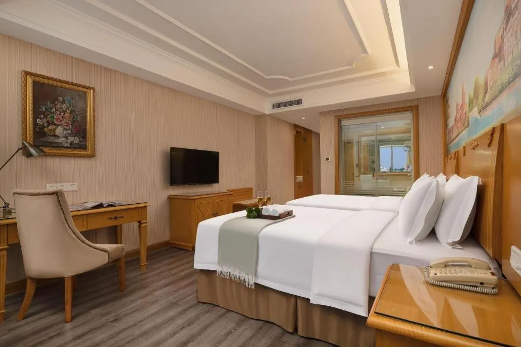 Bed in Vienna Hotel Guangzhou Panyu Shiqiao Center Branch