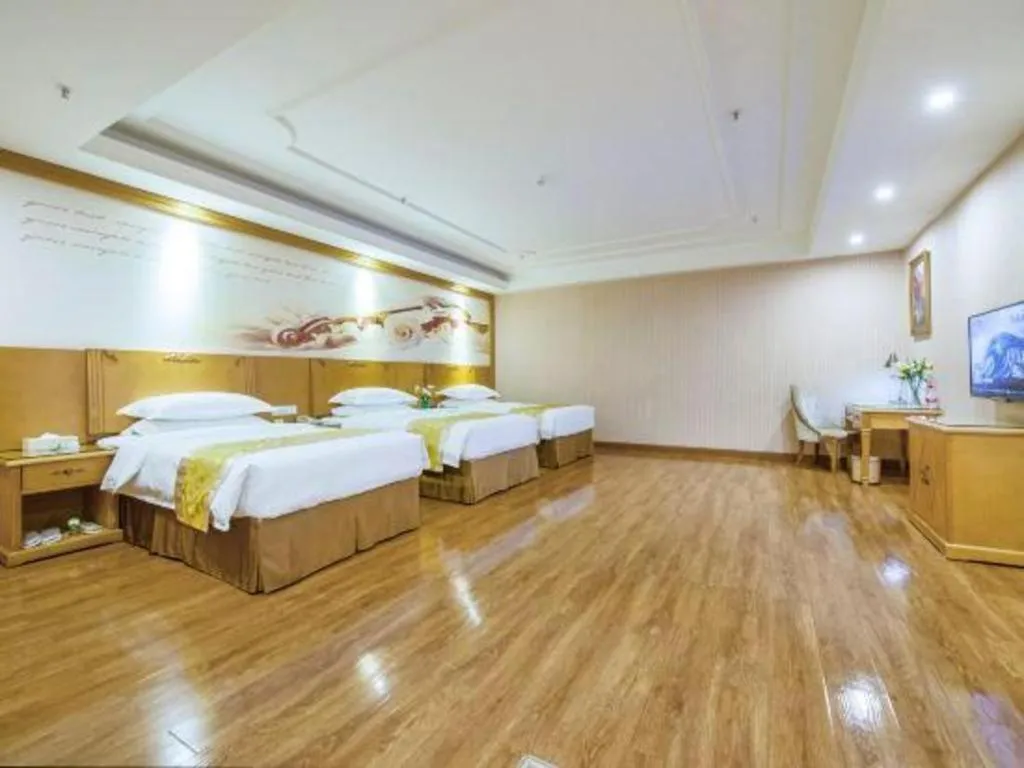 Bed in Vienna Hotel Guangzhou Panyu Shiqiao Center Branch