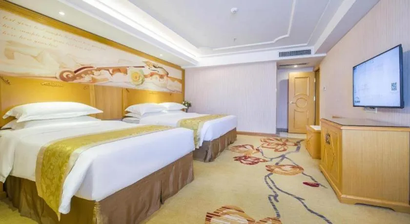 Bed in Vienna Hotel Guangzhou Panyu Shiqiao Center Branch