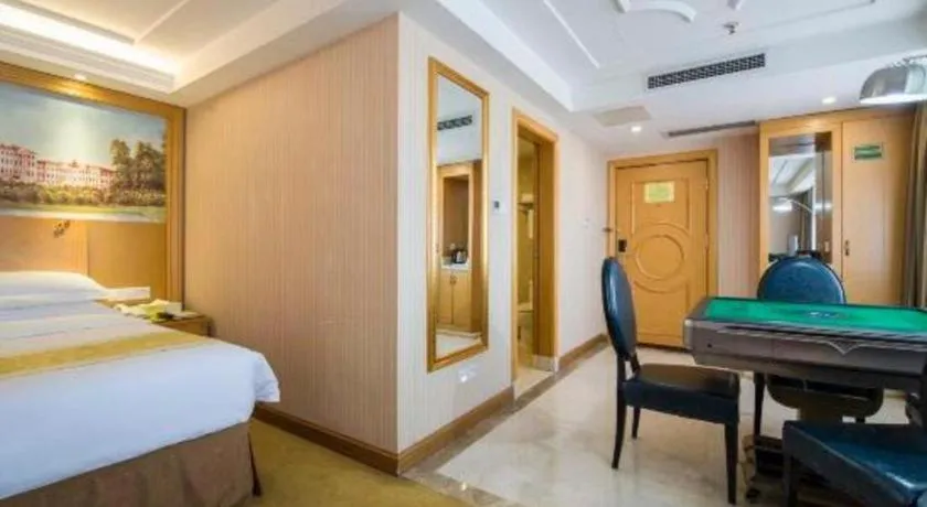 Bed in Vienna Hotel Guangzhou Panyu Shiqiao Center Branch