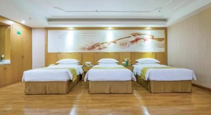 Bed in Vienna Hotel Guangzhou Panyu Shiqiao Center Branch