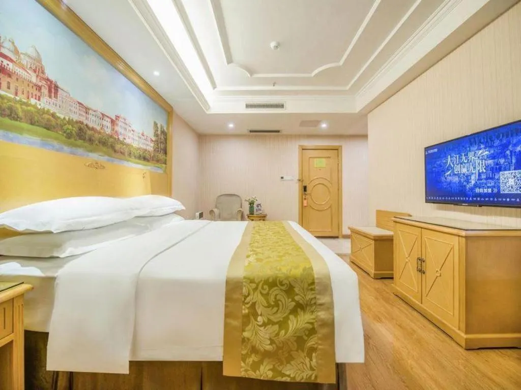 Bed in Vienna Hotel Guangzhou Panyu Shiqiao Center Branch
