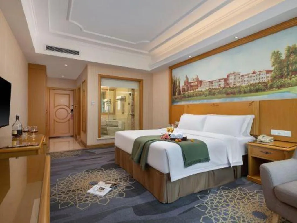 Bed in Vienna Hotel Guangzhou Panyu Shiqiao Center Branch