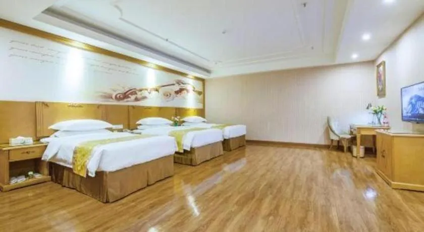 Bed in Vienna Hotel Guangzhou Panyu Shiqiao Center Branch