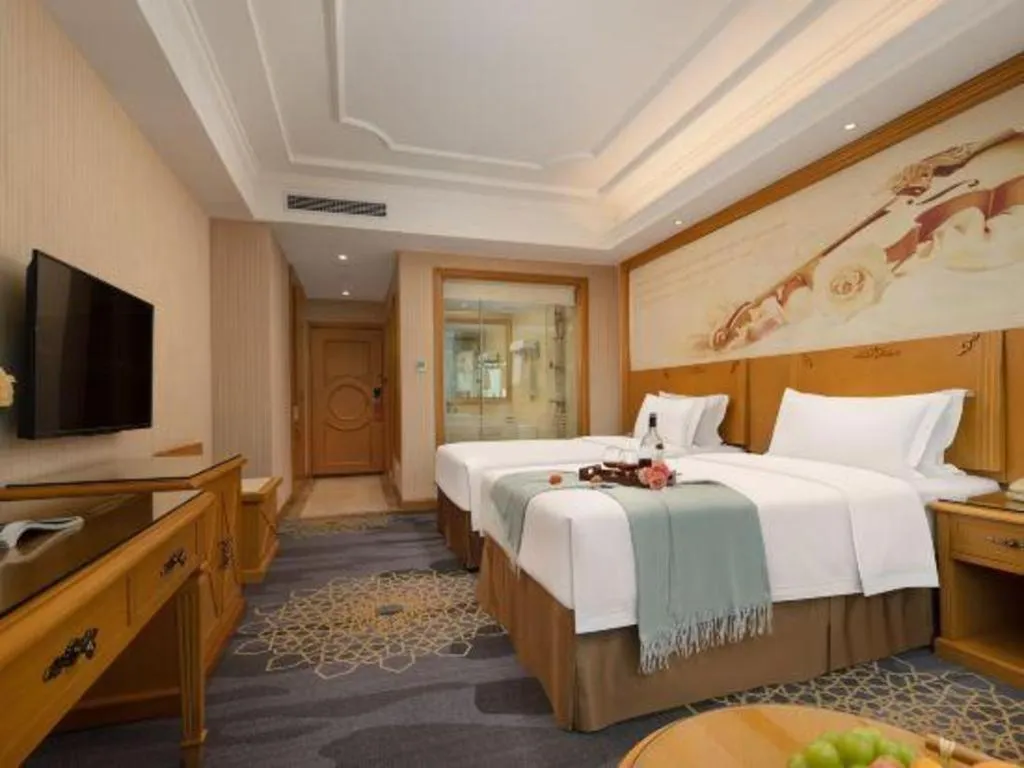 Bed in Vienna Hotel Guangzhou Panyu Shiqiao Center Branch