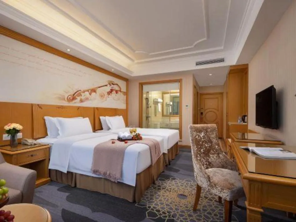 Bed in Vienna Hotel Guangzhou Panyu Shiqiao Center Branch