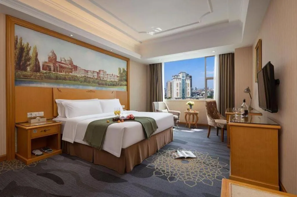 Bed in Vienna Hotel Guangzhou Panyu Shiqiao Center Branch