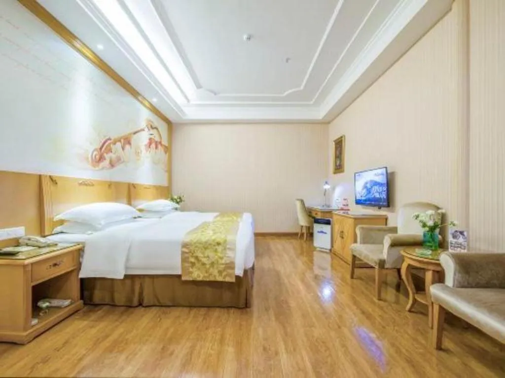 Bed in Vienna Hotel Guangzhou Panyu Shiqiao Center Branch