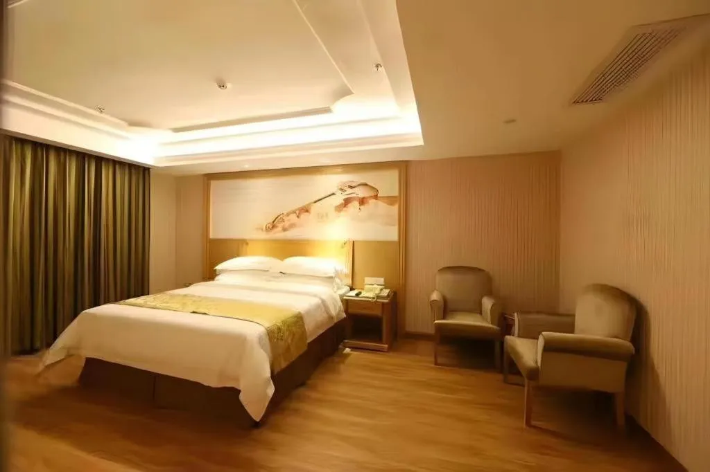 Bed in Vienna Hotel Guangzhou Panyu Shiqiao Center Branch