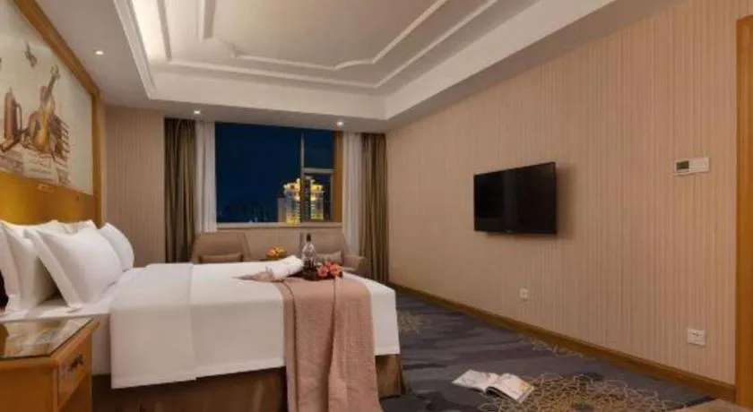 Bed in Vienna Hotel Guangzhou Panyu Shiqiao Center Branch