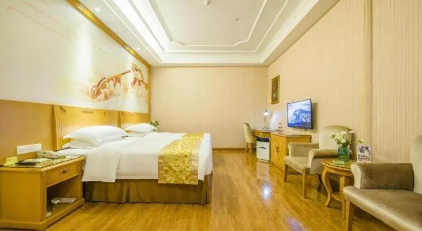 Bed in Vienna Hotel Guangzhou Panyu Shiqiao Center Branch