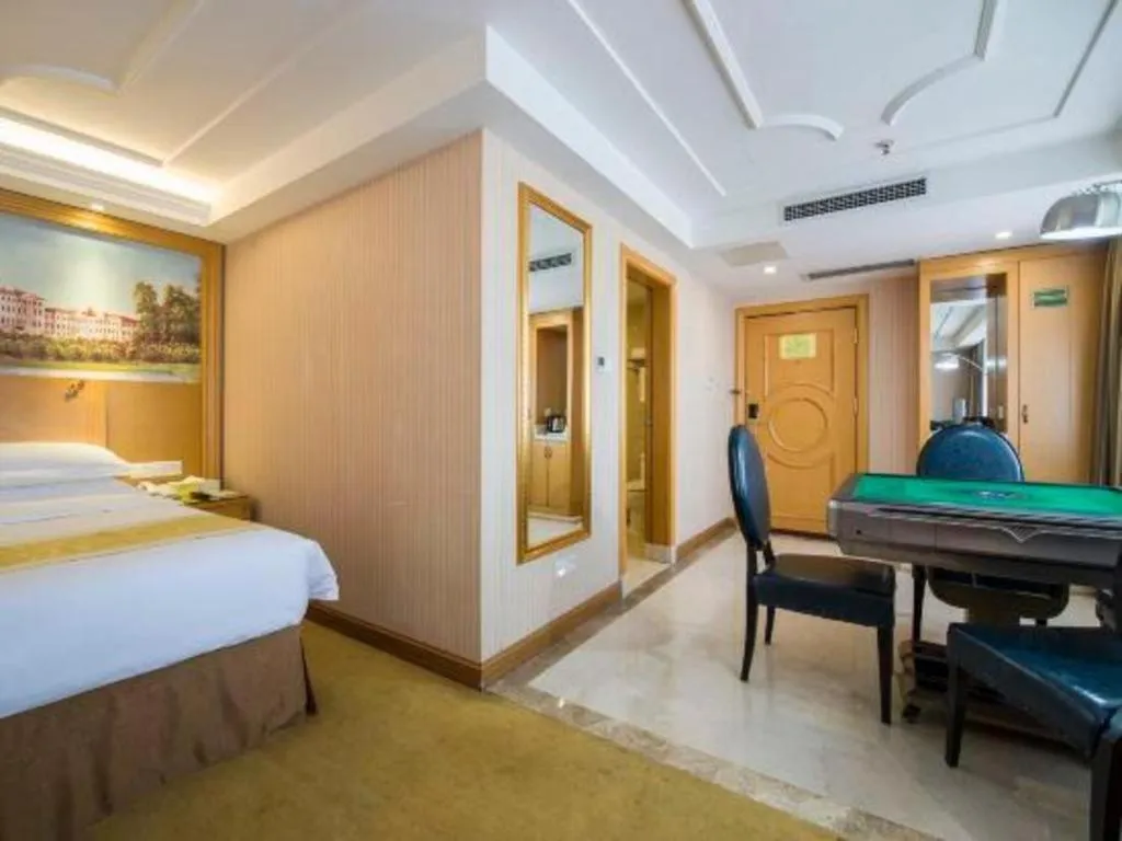 Bed in Vienna Hotel Guangzhou Panyu Shiqiao Center Branch