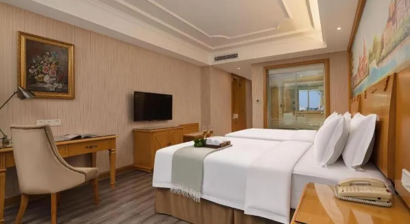 Bed in Vienna Hotel Guangzhou Panyu Shiqiao Center Branch