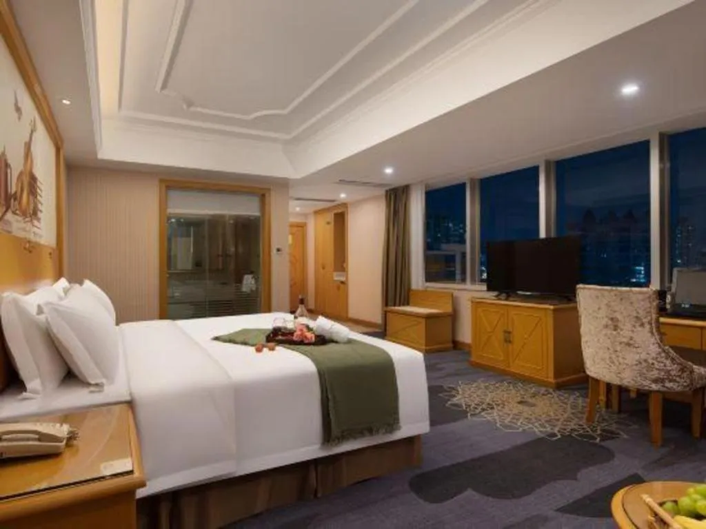 Bed in Vienna Hotel Guangzhou Panyu Shiqiao Center Branch