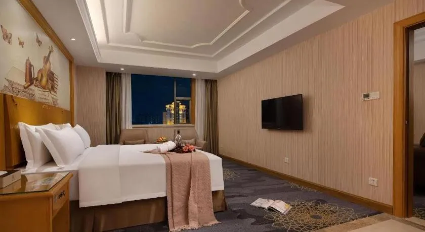 Bed in Vienna Hotel Guangzhou Panyu Shiqiao Center Branch
