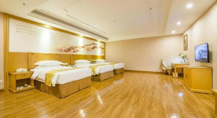 Bed in Vienna Hotel Guangzhou Panyu Shiqiao Center Branch