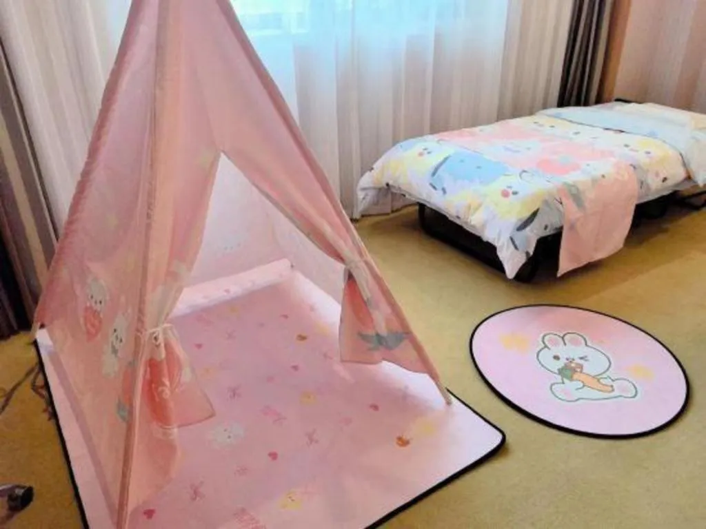 Bed in Vienna International Hotel Shanghai Dishui Lake Lingang Wanda