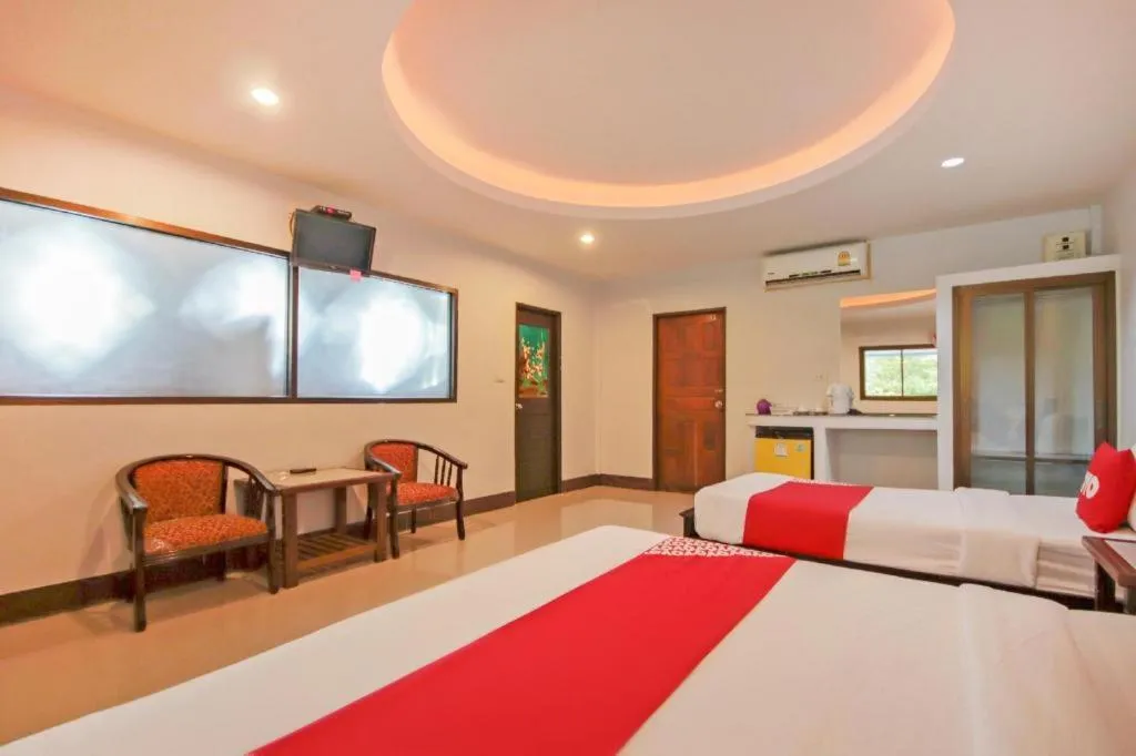 Bed in OYO 75310 Canalis Resort