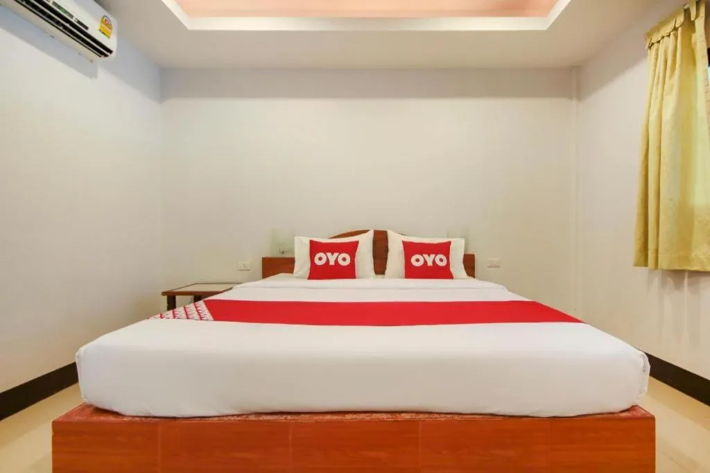 Bed in OYO 75310 Canalis Resort