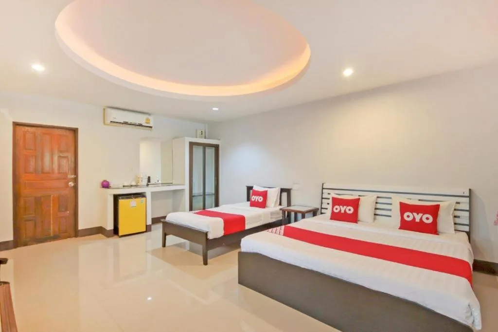 Bed in OYO 75310 Canalis Resort