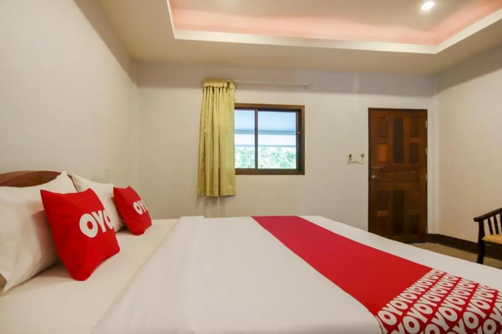 Bed in OYO 75310 Canalis Resort