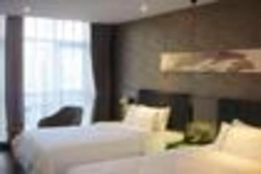 Bed in Yitel Collection Beijing Capital Airport New International Exhibition