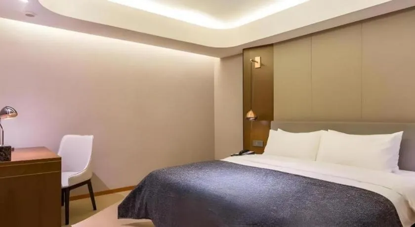 Bed in Yitel Collection Beijing Capital Airport New International Exhibition