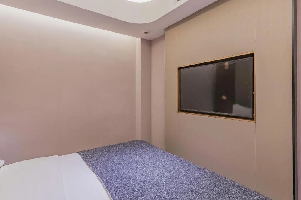 Bed in Yitel Collection Beijing Capital Airport New International Exhibition