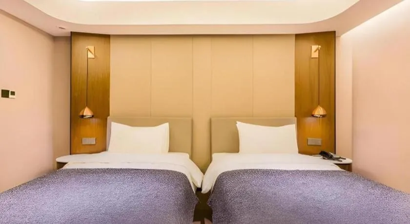 Bed in Yitel Collection Beijing Capital Airport New International Exhibition