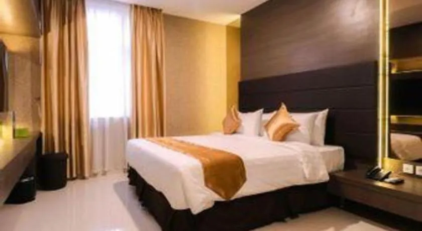 Bed in NIVIA HOTEL
