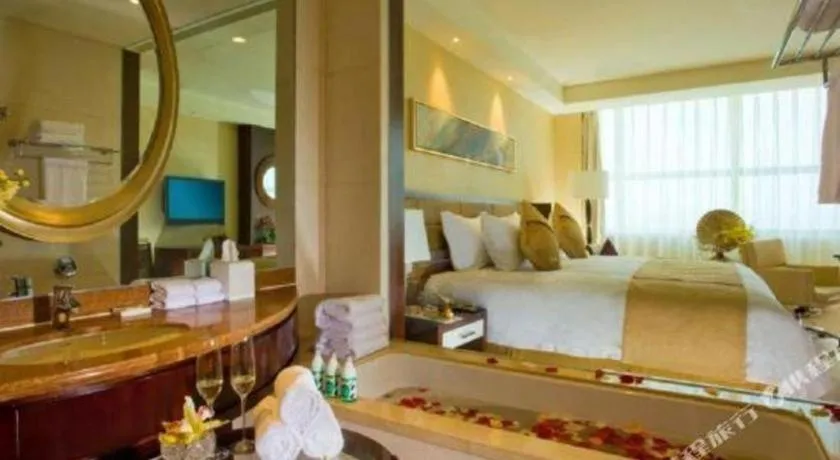 Bed in New Century Grand Hotel Lishui Huaqiao