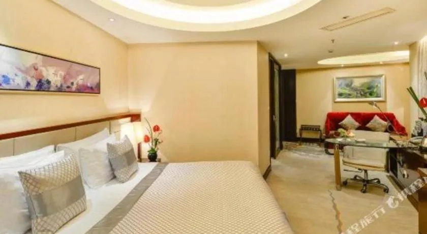 Bed in New Century Grand Hotel Lishui Huaqiao