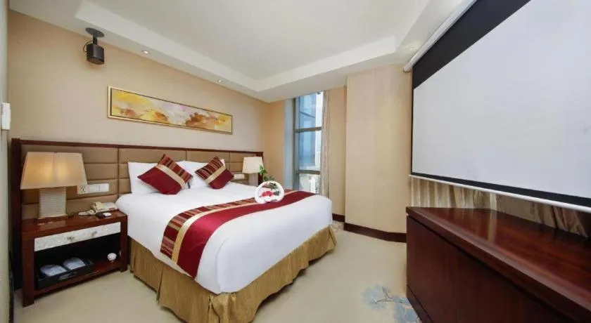Bed in New Century Grand Hotel Lishui Huaqiao